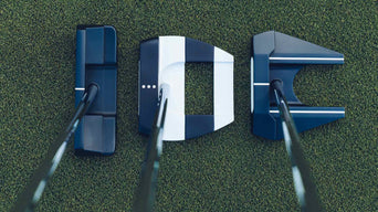 Three Odyssey Square to Square putters on a putting green