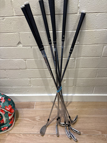 Grips and shafts of a used Callaway Apex iron set