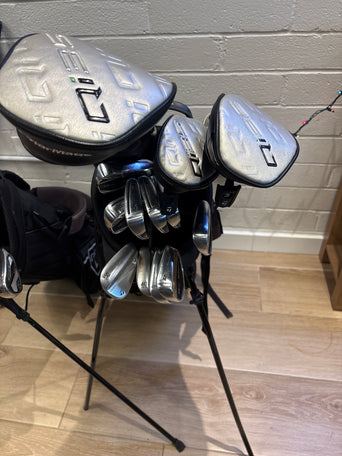 TaylorMade Qi10 irons and woods in a golf bag