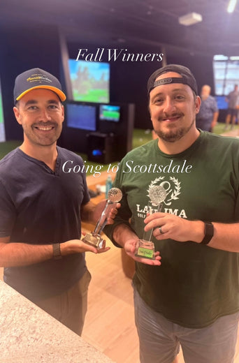 Two golf league winners smiling at Clubhouse Hawaii
