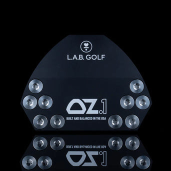 Sole of a black L.A.B. Golf OZ.1 putter